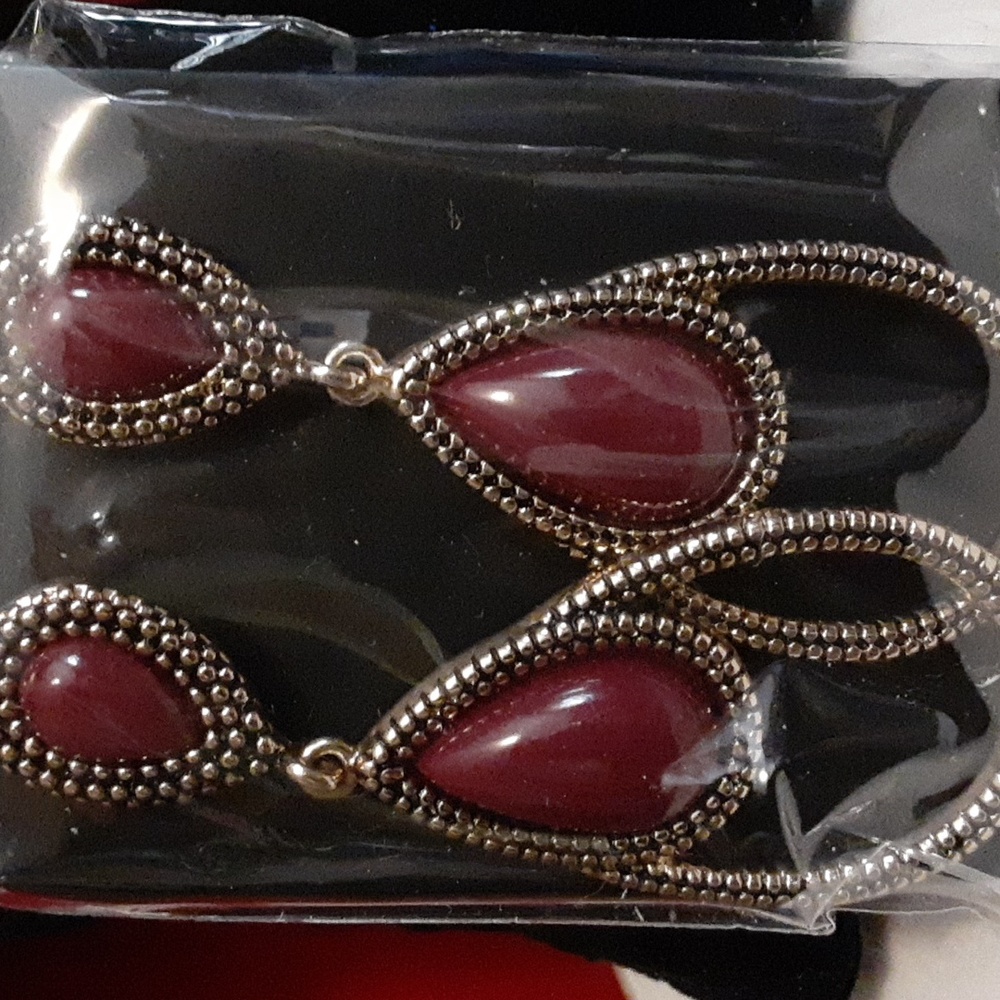 Avon Antique looking Dangle 2 inch RUST Colored